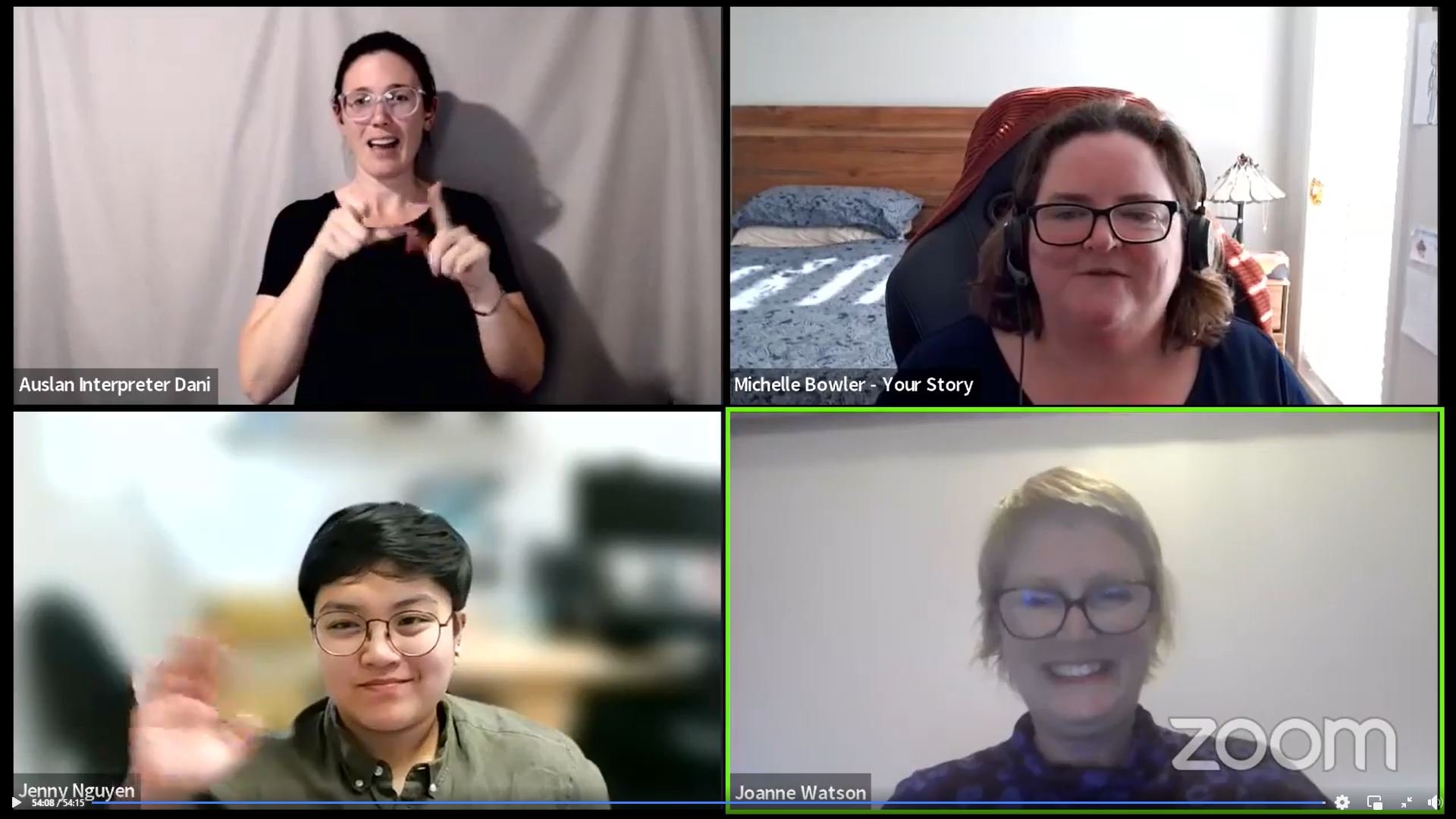 A screenshot from the carers webinar showing three smiling people and an Auslan interpreter